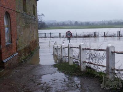 The river Nene in flood at the corner of The Mill [138]